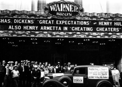 Warner Grand Theatre Marquee Great Expectations with Crowd Posed in Front of Theatre