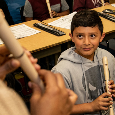Students playing recorder