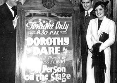 Warner Grand Theatre Historical Photo of Dorothy Dare Next to Sign