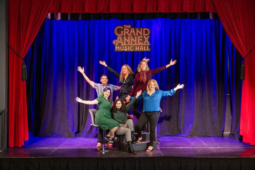 GRAND VISION FOUNDATION STAFF & LEADERSHIP (l to r): Andrew Aragon, Christa Klee, Alexa Clement (seated bottom), Joselyn Wilkinson (top in black), Taran Schindler (artistic director), and Liz Schindler Johnson (executive director). (photo: John Mattera Photography)