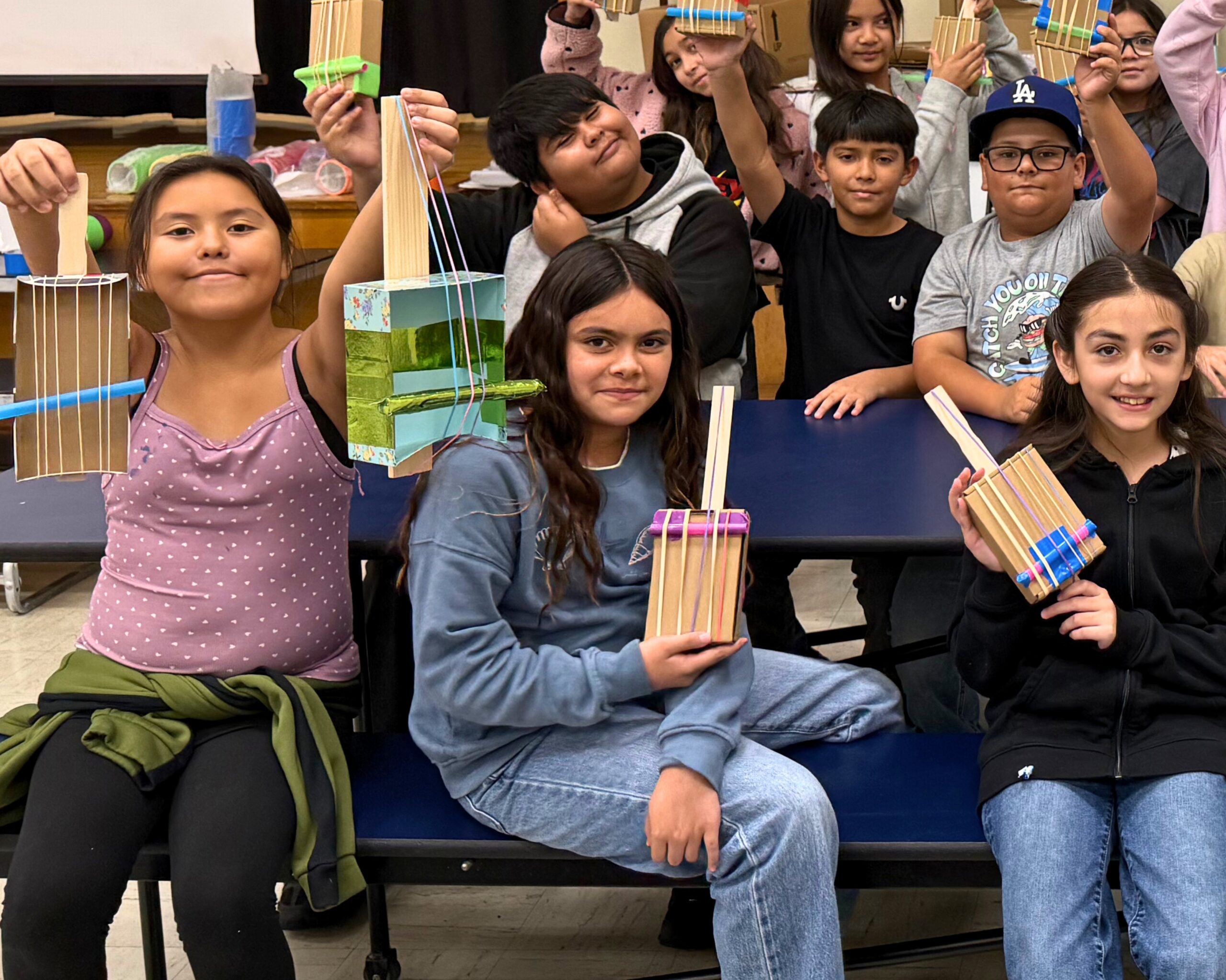 Meet the Music Students pictured with handmade guitars